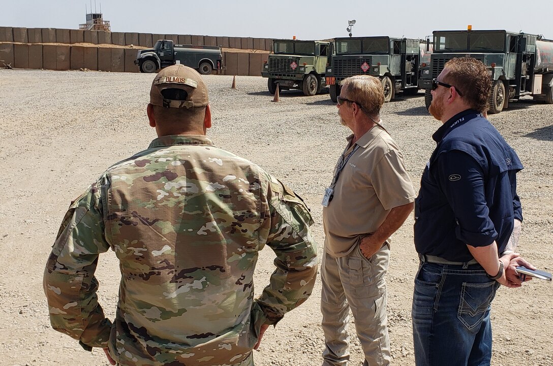 An Air Force member briefs contractors at the Chabelley Airfield retail fuel point in Djibouti on fuel operations and status of equipment. In March 2022, base life support services to deployed service members at Chabelley Airfield, to include fuel and petroleum operations, will be provided by the 405th Army Field Support Brigade’s Logistics Civil Augmentation Program. (U.S. Army courtesy photo)