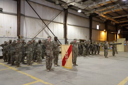 The 329th Regional Support Group salutes during a transfer of authority ceremony Nov. 23, 2021, at Al Asad Air Base, Iraq. The transfer officiated the unit’s downgrade at the base from an O-6 command to a O-5 command, which is a demonstrative step towards Combined Joint Task Force Operation Inherent Resolve’s advise, assist, and enable phase. (U.S. Army photo by Maj. Alexa Carlo-Hickman)