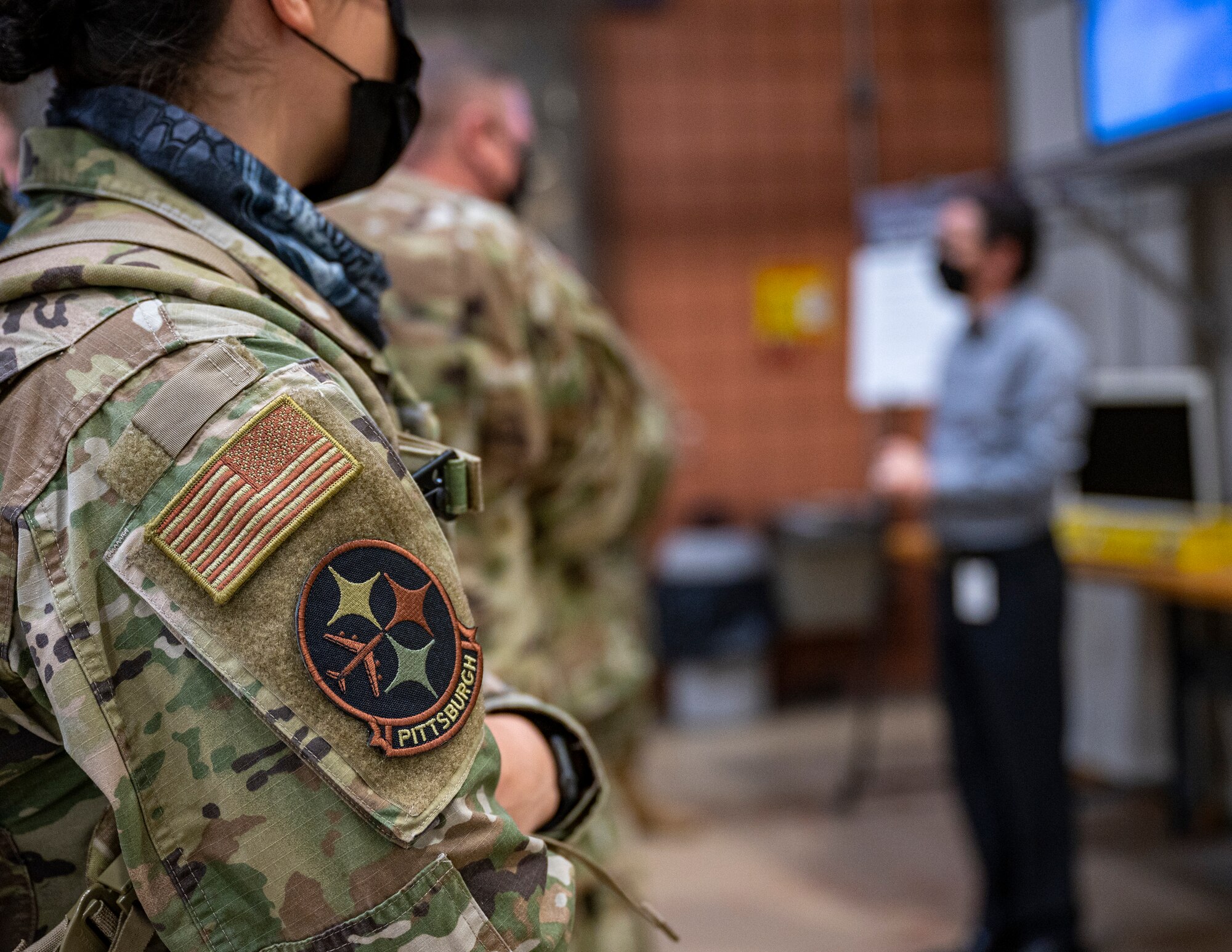 171st ARW Patch on an airman's arm during a briefing