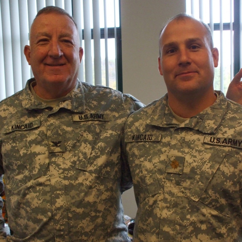 Many fathers can only dream that their children will follow in their footsteps. But for Col. Robert J. Kincaid Jr., (right) he turned this dream into a reality for his dad. Kincaid Jr., the current commander of the 111th Theater Engineer Brigade, is in the exact same spot that his father was 18 years ago – commanding the 111th while deployed to the Central Command Area of Operations. Col. (Ret.) Robert J. Kincaid Sr. (left) was the commander of the then 111th Engineer Group during a deployment to the Middle East in 2003. (1st Lt. James Mason)