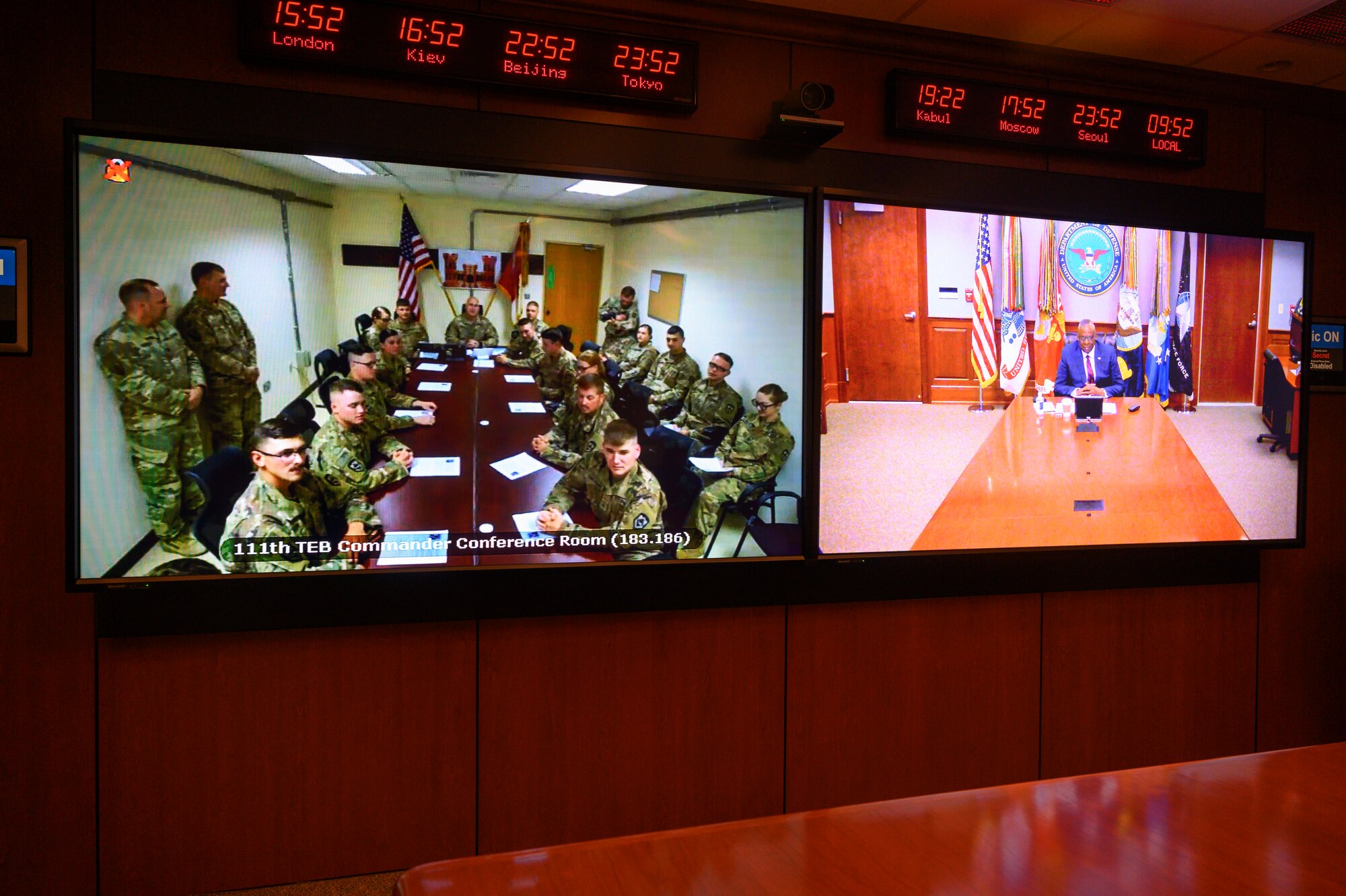 Secretary of Defense Lloyd J. Austin III speaks with service members with the 111th Engineer Brigade who are deployed to Camp Buehring, Kuwait, virtually, the Pentagon, Washington, D.C., Nov. 24, 2021.