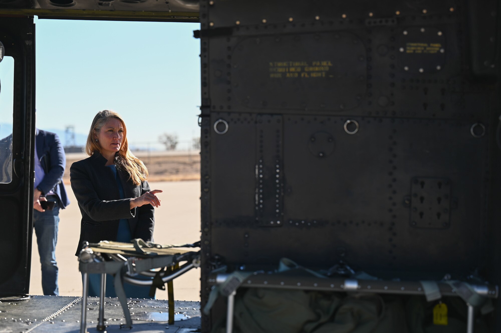 U.S. Rep. Melanie Stansbury tours an aircraft.
