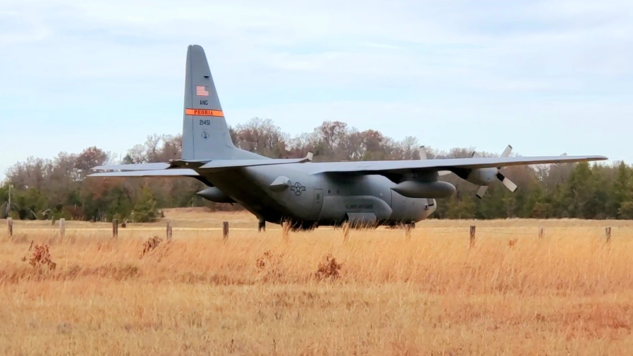 An aircrew operates a C-130 Hercules during training operations Nov. 20, 2021, at Young Air Assault Strip on South Post at Fort McCoy, Wis. The C-130 is from the 182nd Airlift Wing with the Illinois Air National Guard. The C-130 was flown by aircrews with the 169th Airlift Squadron out of Peoria Ill. Young Air Assault Strip, which has also been called Young Field, originally opened in October 1984. It was constructed by the 618th Engineer Company, 360th Engineer Battalion, 82nd Airborne Division. The air strip was named after Pfc. Raphael Young, a member of the 618th who died in September 1984 while training on heavy equipment in advance of the mission to build the air strip. Young Air Assault Strip has been used for decades as a multiservice air strip that can be used in a variety of ways. It can replicate a terminal; used to receive process, and stage personnel, cargo, and equipment; or used as an austere airfield. (U.S. Army Photo by Scott T. Sturkol, Public Affairs Office, Fort McCoy, Wis.)