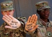 Sgt. Rebecca Landry and Spc. Asia Jones, 529th Support Battalion Soldiers, helped spread a powerful message in June to help reduce suicides within the Army.