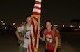 Sgt. Mariah Robinson, left, and Spc. Morgan Miller, pose for a picture with an American flag after a nighttime ruck march in commemoration of Veterans Day Nov. 11, 2021, at Camp As Sayliyah, Qatar.

Robinson and Miller are University of Nebraska students and members of the Nebraska Army National Guard’s 734th Combat Sustainment Support Battalion, currently deployed to assist with the Afghan Evacuations Mission Support Element.