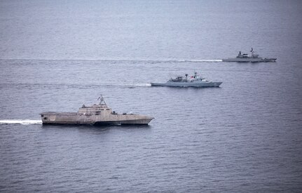 USS Tulsa (LCS 16), KD Lekiu (FFG 30) and KD Lekir (F 26) sail in formation in the Strait of Malacca during Maritime Training Activity (MTA) Malaysia 2021, Nov. 27.