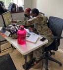 U.S. Air Force Airman 1st Class Evaughn Aponte, left, 11th Comptroller Squadron finance technician, and Airman 1st Class Jasmine Butler, 11th CPTS financial analysis technician, work to complete the successful fiscal year 2021 closeout for the 11th Wing at Joint Base Anacostia-Bolling, Washington, D.C., Sept. 30, 2021. Every year in September, comptroller and contracting squadrons work long hours to close out the fiscal year with intention and precision. Fiscal years 2020 and 2021 were unique for JBAB as the Air Force transitioned to the service responsible for the joint installation. (U.S. Air Force photo by Lt. Col. Michael Chua)