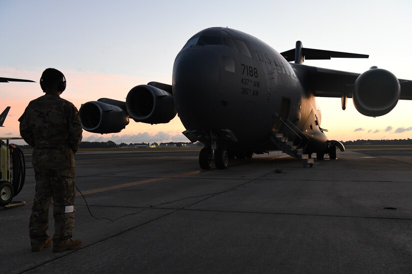U.S. Marines from the Combat Logistics Company 21 wait for takeoff on a C-17 Globemaster III during a training mission on Marine Corps Air Station Cherry Point, North Carolina, Oct. 26, 2021.