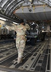 U.S. Marines from the Combat Logistics Company 21 wait for takeoff on a C-17 Globemaster III during a training mission on Marine Corps Air Station Cherry Point, North Carolina, Oct. 26, 2021.