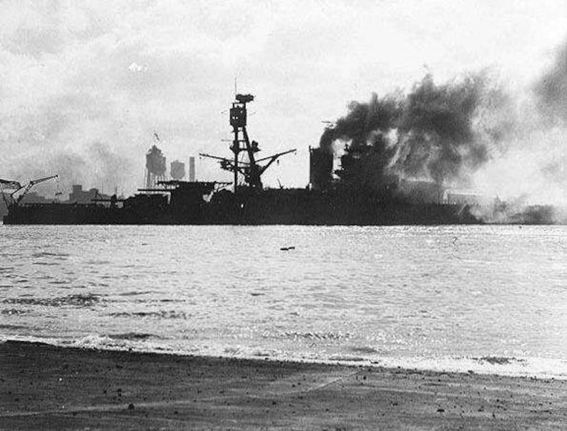 A ship burns after being attacked.