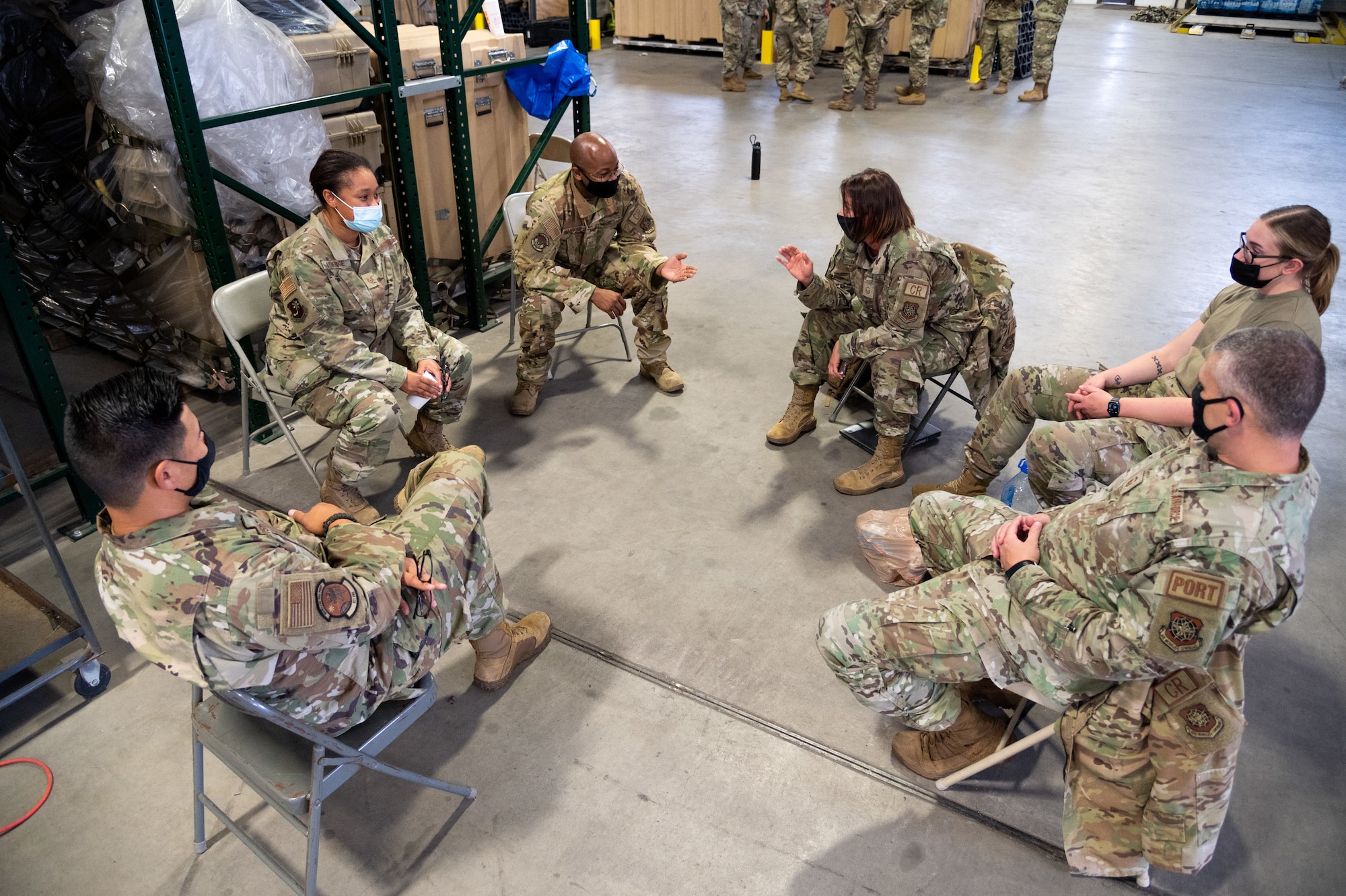 U.S. Airmen assigned to the 621st Contingency Response Wing discuss modernization efforts Oct. 8, 2021, at Joint Base McGuire-Dix-Lakehurst, New Jersey. The 621st CRW is accelerating change by adding another CR squadron to the 821st CRG at Travis Air Force Base, California, and the 621st CRG at JBMDL. (U.S. Air Force photo by Staff Sgt. Sarah Brice)