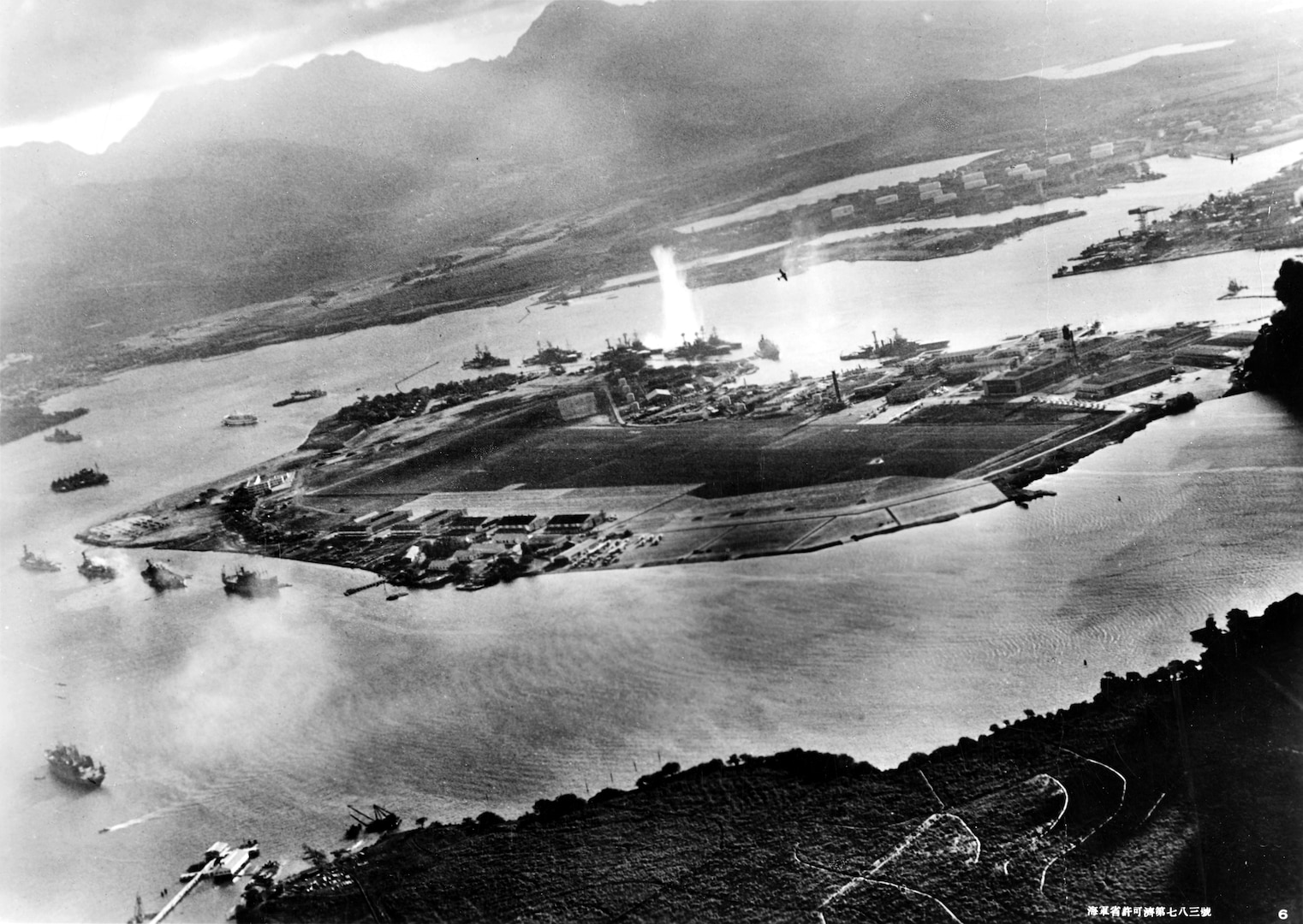 A ship is hit by a torpedo during an attack.