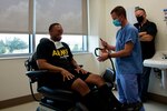 doctor presents patient with facial mask
