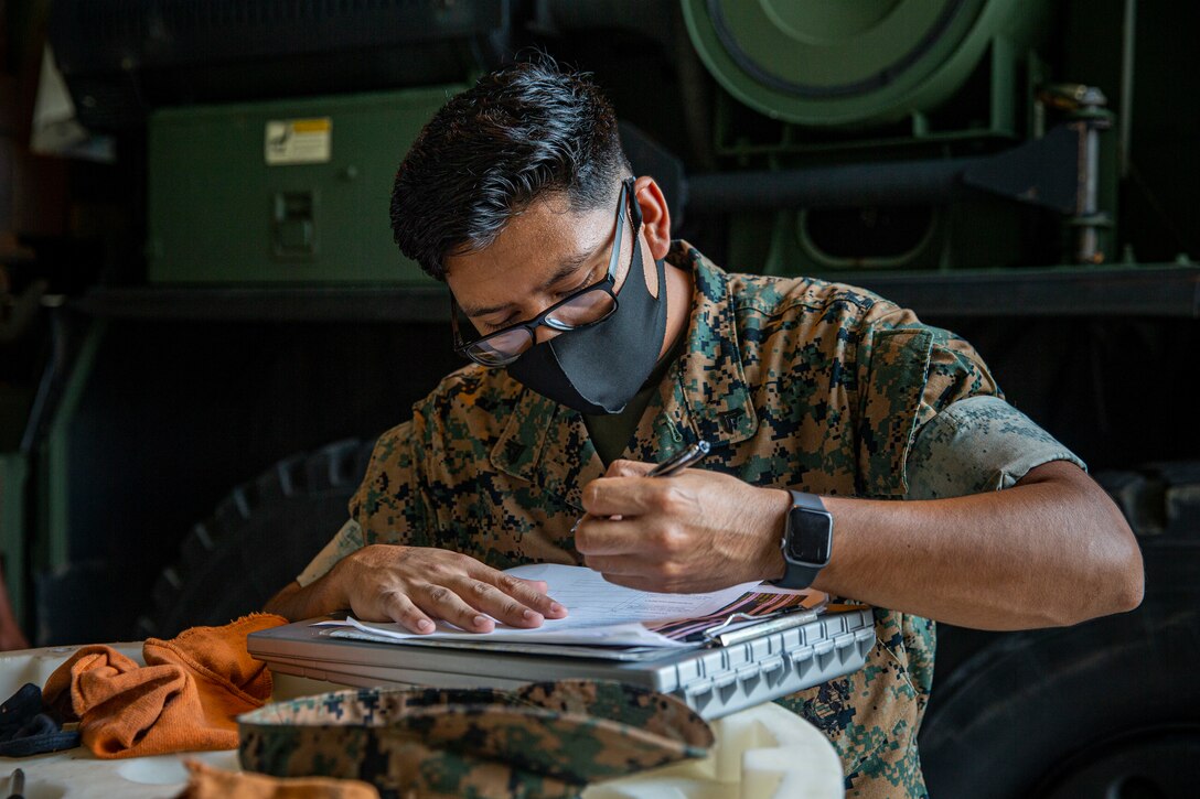 U.S. Marine Corps Cpl. Rendy Catete, the training noncommissioned officer in charge with the Environmental Support Team, Headquarters and Support Battalion, Marine Corps Installations Pacific, conducts an environmental safety audit on Camp Foster, Okinawa, Japan, Sep. 28, 2021. Catete was originally born in the U.S. and moved to Monterrey, Mexico, with his family where he lived for the first three years of his life. His parents, seeking better paying jobs and higher education for their four children, immigrated to Dallas, Texas, and began their family’s journey to citizenship. (U.S. Marine Corps photo by Lance Cpl. Alex Fairchild)