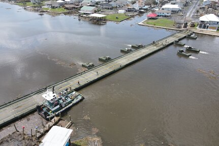 Louisiana National Guard engineer work teams assigned to the 2225th Multi-Role Bridge Company, 225th Engineer Brigade, completed the massive build of a 24-Bay Improved Ribbon Bridge (IBR), Jean Lafitte, La., Sept. 5, 2021. During Hurricane Ida’s initial impact, the only bridge leading into the community of Barrataria was destroyed due to the strong storm surge.