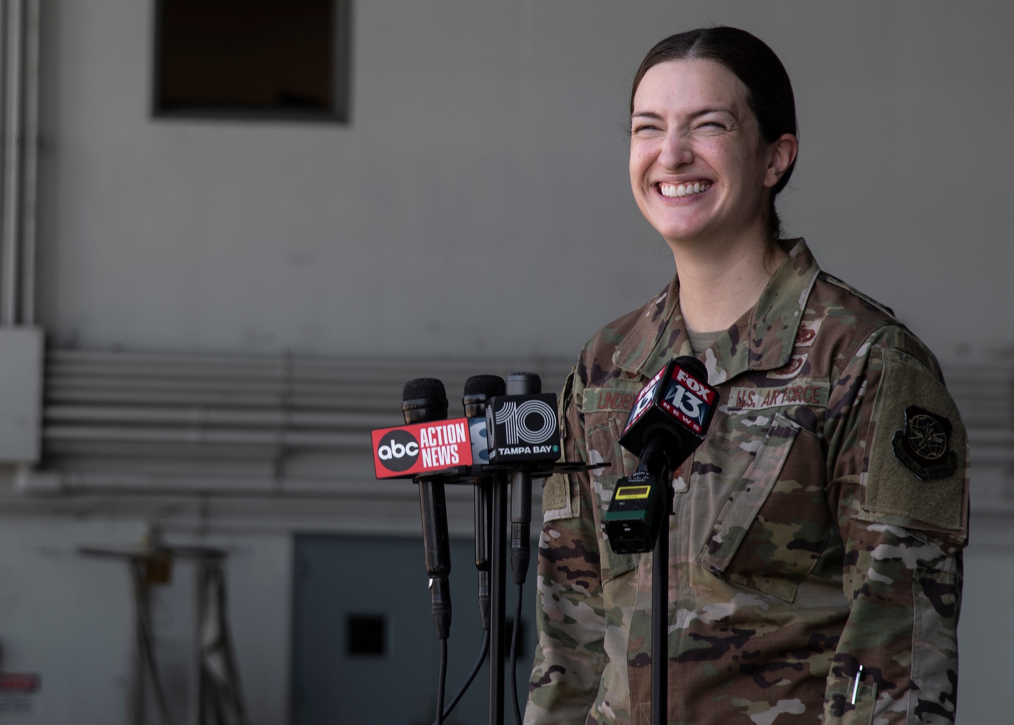 U.S. Air Force Maj. Jennifer Lindberg, 6th Aircraft Maintenance Squadron commander, responds to local media outlets at MacDill Air Force Base, Florida, Sept. 27, 2021.