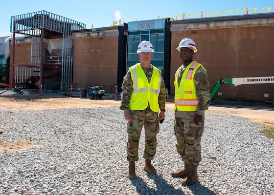 Command Sgt. Maj. Chad Blansett, U.S. Army Corps of Engineers, South Atlantic Division, and Command Sgt. Maj. Darien Lawshea, U.S. Army Signal Regiment, tour the site of Fort Gordon's new U.S. Army Cyber Center of Excellence Sept. 29.