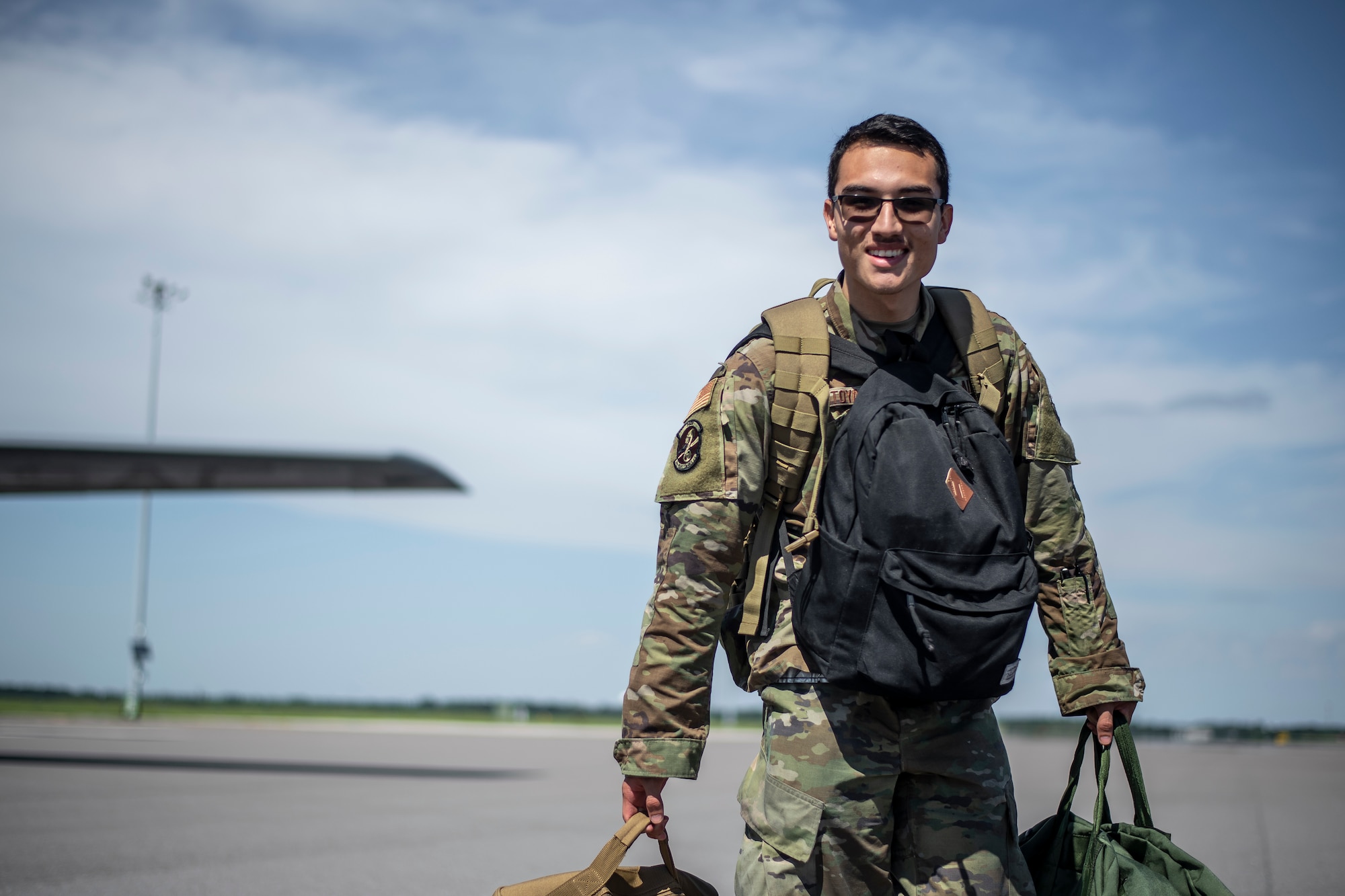 A maintenance specialist from the 6th Maintenance Group smiles after returning home from deployment at MacDill Air Force Base, Florida, Sept. 27, 2021.