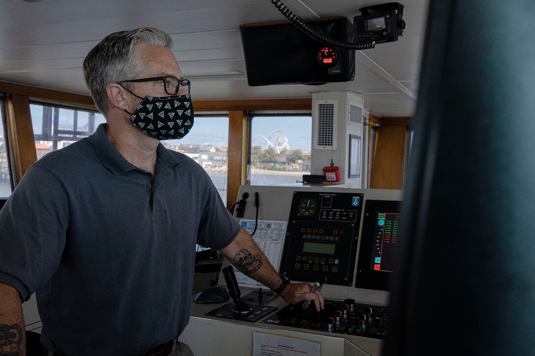 U.S. Army Corps of Engineers, Wilmington District’s, Lee Willis, assistant master, navigates the Hopper Dredge MURDEN during 24/7 dredging operations near Ocean City, Md., Sept 20, 2021. The USACE Baltimore District routinely receives services from the Wilmington District’s MURDEN or its sister ship CURRITUCK to Ocean City for routine dredging in and around the Inlet. The Baltimore District manages the Ocean City Inlet federal navigation channel and Assateague Bypass project while the Wilmington District staffs, trains, and equips these special-purposes dredges which work up and down the Atlantic and Gulf coasts dredging similar inlets or near-shore coast projects. (U.S. Army photo by Greg Nash)