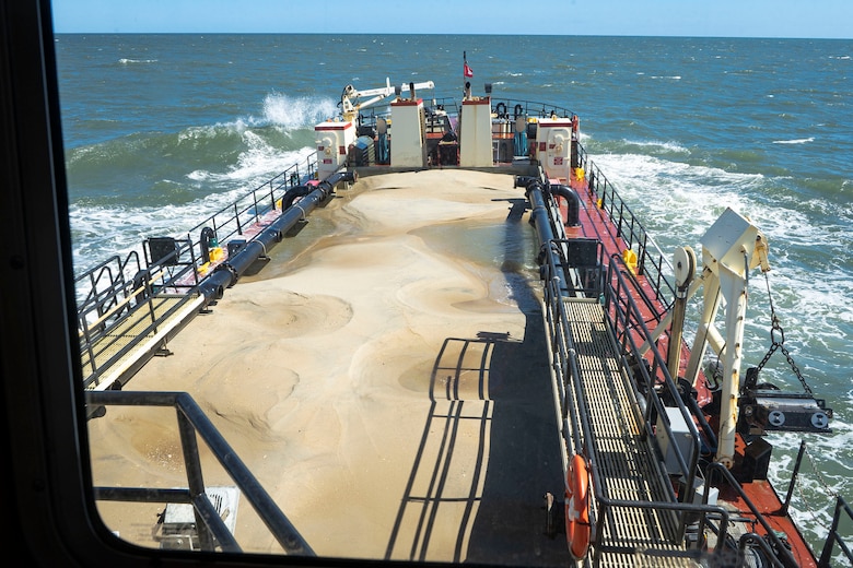 U.S. Army Corps of Engineers, Wilmington District’s, Hopper Dredge MURDEN transits material from an offshore dredge site to the beach near Assateague Island, Md., Sept. 20, 2021. USACE Baltimore District, the Maryland Department of Natural Resources and Worcester County have signed a project partnership agreement for the Ocean City Harbor and Inlet navigation improvement project. The District will continuously evaluate sediment transport in the Inlet and recommend options to manage the shoaling. (U.S. Army photo by Greg Nash)