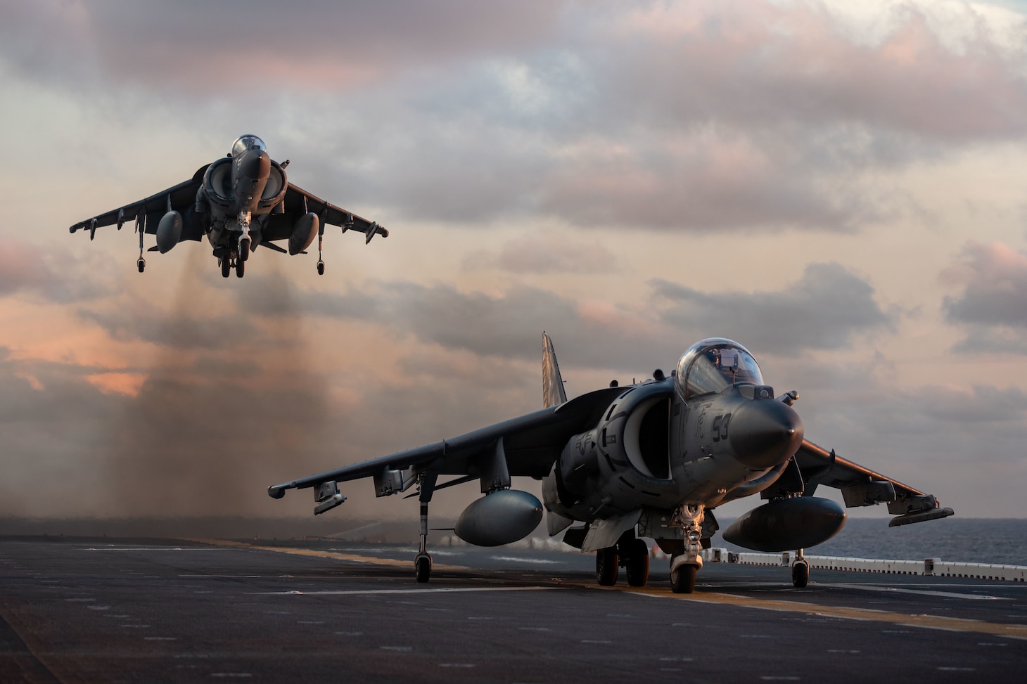 AV-8B Harriers attached to Marine Attack Squadron (VMA) 542 land aboard the Wasp-class amphibious assault ship USS Kearsarge (LHD 3) Sept. 23, 2021.