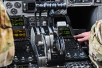 U.S. Air Force pilots assigned to the 437th Airlift Wing prepares a C-17 Globemaster III for a flight to deliver cargo and troops to Afghanistan at Joint Base Charleston, S.C.