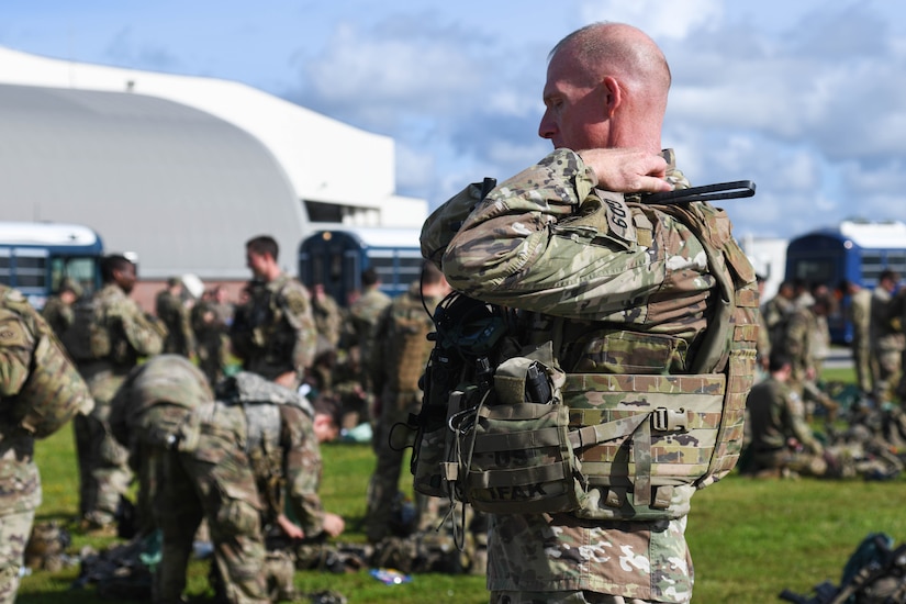 A U.S. Army Soldier assigned to the 82nd Airborne Division, Pope Army Airfield, N.C., prepares to board a C-17 Globemaster III at Joint Base Charleston, S.C.