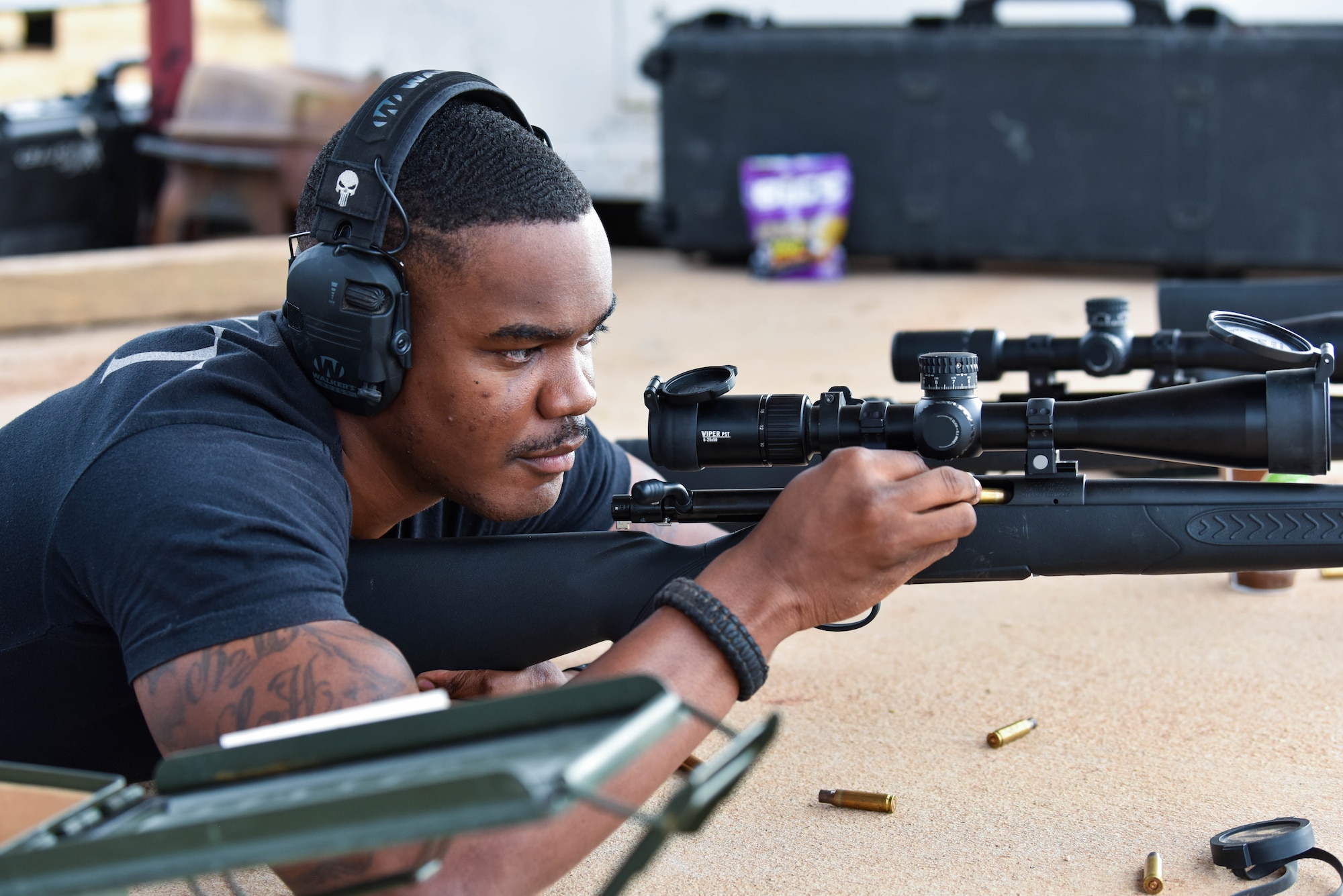 U.S. Air Force Staff Sgt. Christopher Little, 17th Security Forces Squadron flight chief, reloads his weapon during the joint marksmanship training course at the San Angelo Police Department firing range in San Angelo, Texas, Sept. 29, 2021. During the course, members had to familiarize themselves with several sniper weapons systems to hit targets accurately. (U.S. Air Force photo by Senior Airman Jermaine Ayers)