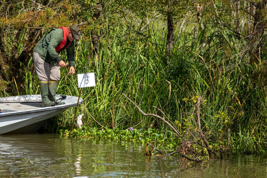 David Mackintosh, acting chief of the U.S. Army Corps of Engineers’ (USACE) Houston Project Office, checks a gator bait line at the USACE Wallisville Lake Project during the Lonestar Warriors Outdoors Gator Hunt. The event is a sponsored alligator hunt for combat injured veterans. In partnership with the Texas Parks and Wildlife Department game wardens and Lone Star Warriors Outdoors, USACE Galveston hosted the hunt as a way to successfully manage alligator populations in support of environmental stewardship and maintain its wounded warrior outreach program.