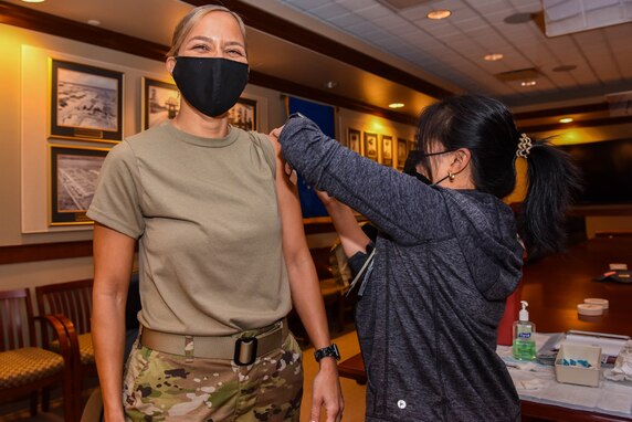 U.S. Air Force Chief Master Sgt. Rebecca Arbona, 17th Training Wing command chief, receives her flu vaccination on Goodfellow Air Force Base, Texas, Oct. 1, 2021. The 17th Medical Group have scheduled flu vaccines lines to safely and efficiently administer shots to active duty personnel. (U.S. Air Force photo by Senior Airman Jermaine Ayers)