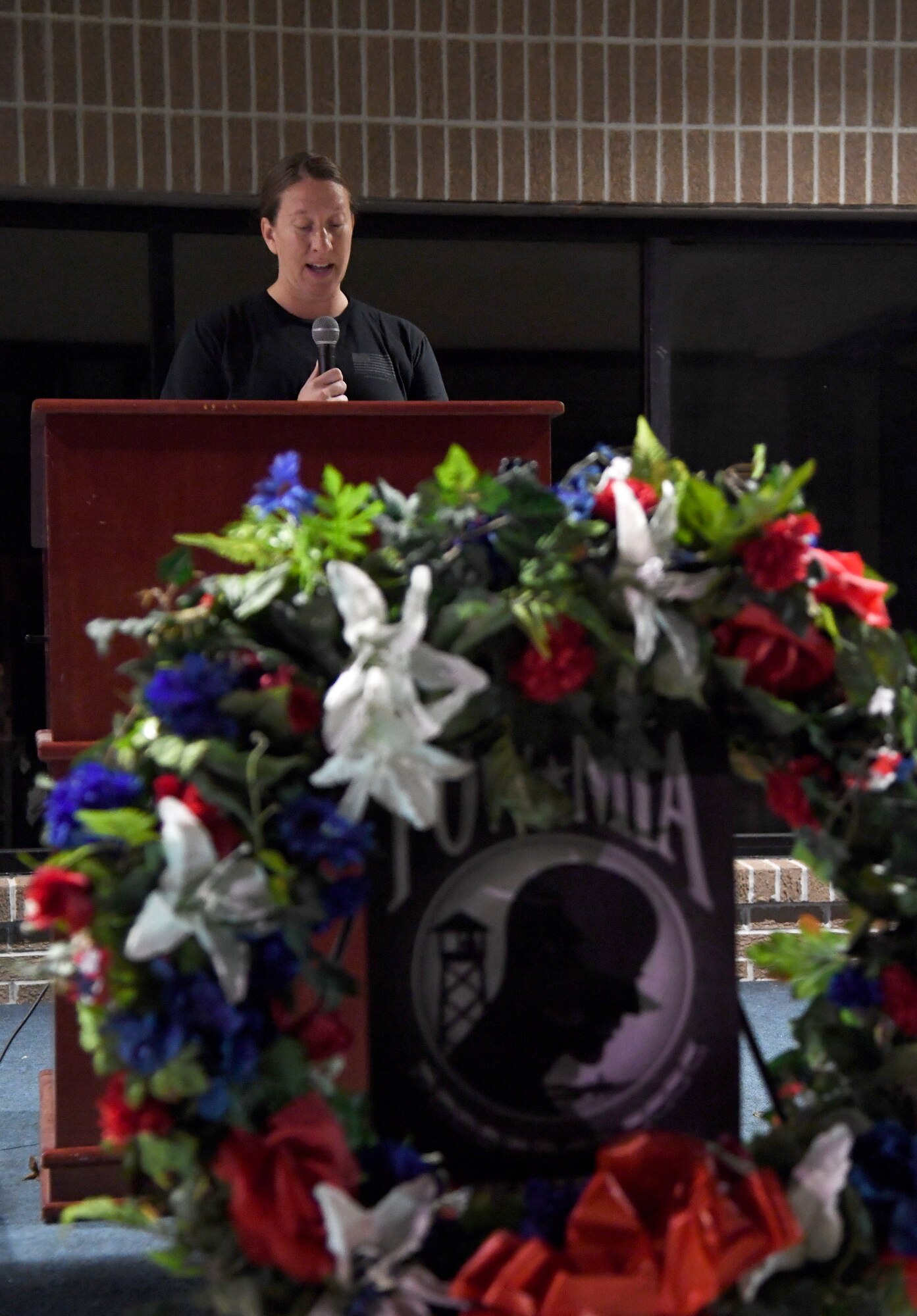 U.S. Air Force Lt. Col. Jill Heliker, 81st Training Group deputy commander, delivers remarks during the POW/MIA run and vigil opening ceremonies at Keesler Air Force Base, Mississippi, Oct. 1, 2021. This event, hosted by the Air Force Sergeants Association Chapter 652, is held annually to raise awareness and pay tribute to all prisoners of war and the military members still missing in action. (U.S. Air Force photo by Kemberly Groue)