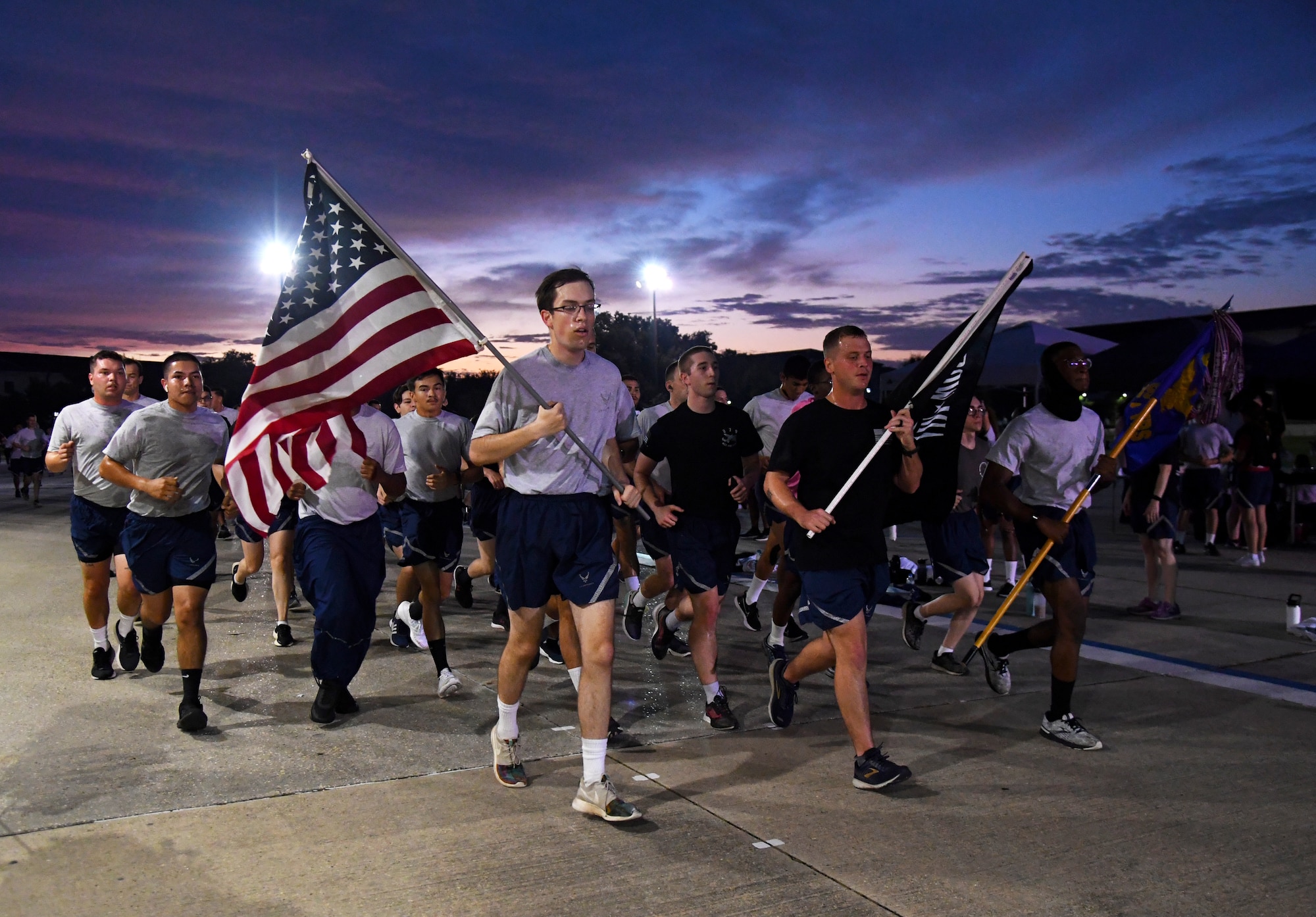 Keesler personnel participate in the POW/MIA run and vigil at Keesler Air Force Base, Mississippi, Oct. 1, 2021. This event, hosted by the Air Force Sergeants Association Chapter 652, is held annually to raise awareness and pay tribute to all prisoners of war and the military members still missing in action. (U.S. Air Force photo by Kemberly Groue)