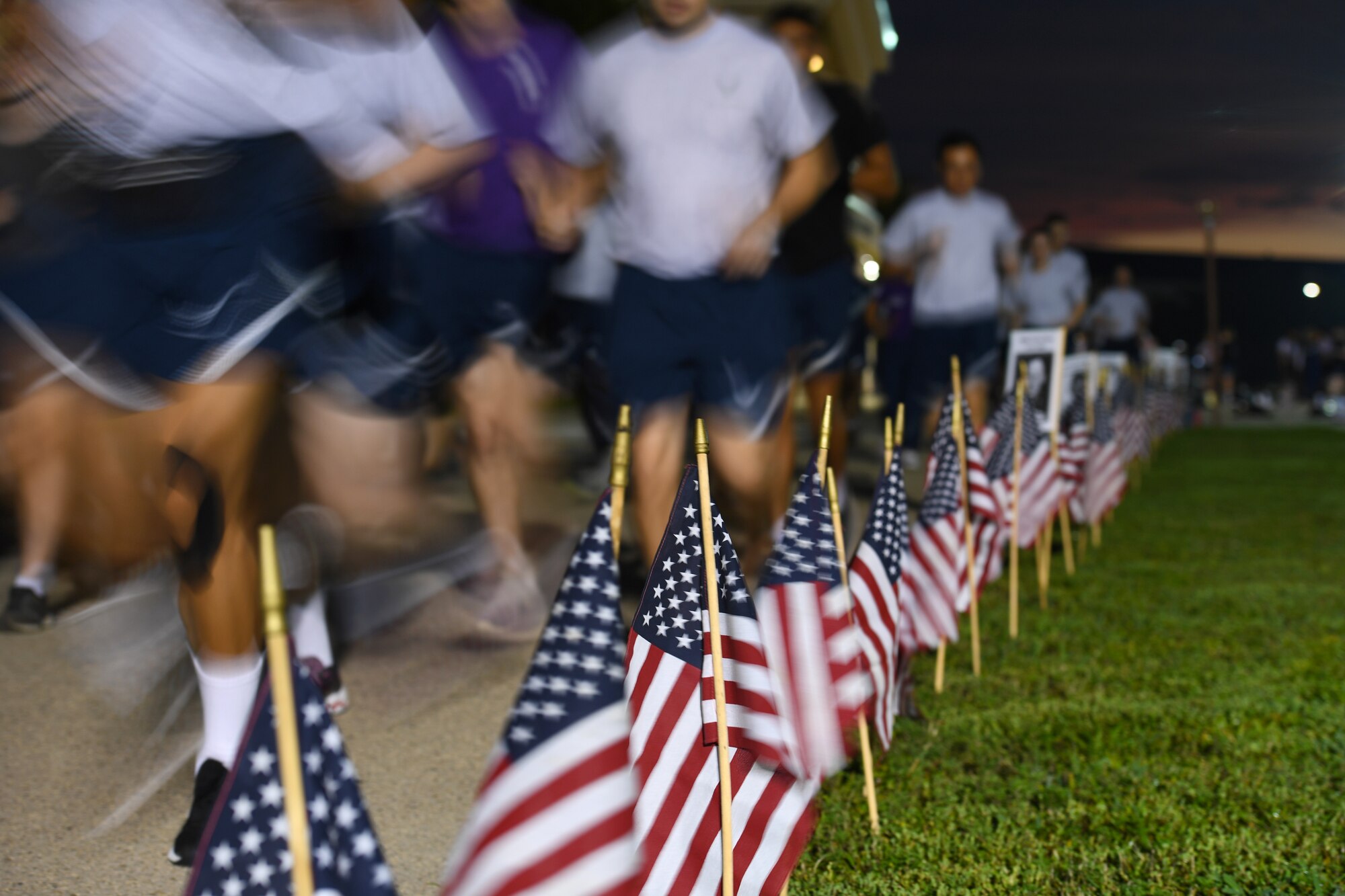 Keesler personnel participate in the POW/MIA run and vigil at Keesler Air Force Base, Mississippi, Oct. 1, 2021. This event, hosted by the Air Force Sergeants Association Chapter 652, is held annually to raise awareness and pay tribute to all prisoners of war and the military members still missing in action. (U.S. Air Force photo by Kemberly Groue)