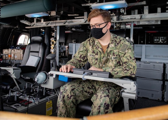 USS Charleston (LCS 18) Sailor Conducts Maintenance