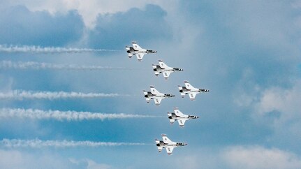 Six Air Force Thunderbird jets fly in a formation