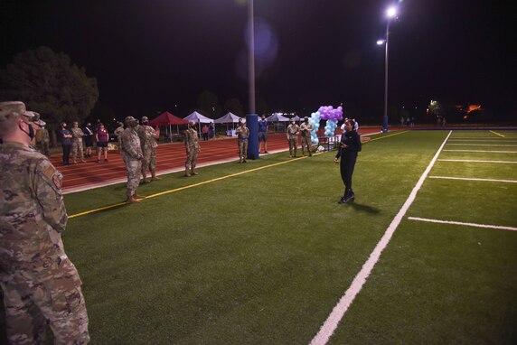 U.S. Air Force Staff Sgt. Sabrina Scruggs, 315th Training Squadron instructor, addresses attendees at the Suicide Awareness 24-Hour Run/Walk on Goodfellow Air Force Base.