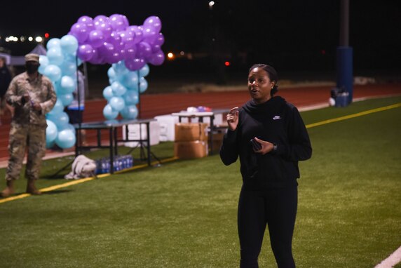 U.S. Air Force Staff Sgt. Sabrina Scruggs, 315th Training Squadron instructor, addresses attendees at the Suicide Awareness 24-Hour Run/Walk on Goodfellow Air Force Base.