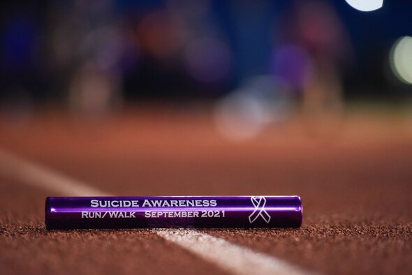 A baton is displayed on the Mathis Field track during the Suicide Awareness 24-Hour Run/Walk on Goodfellow Air Force Base.