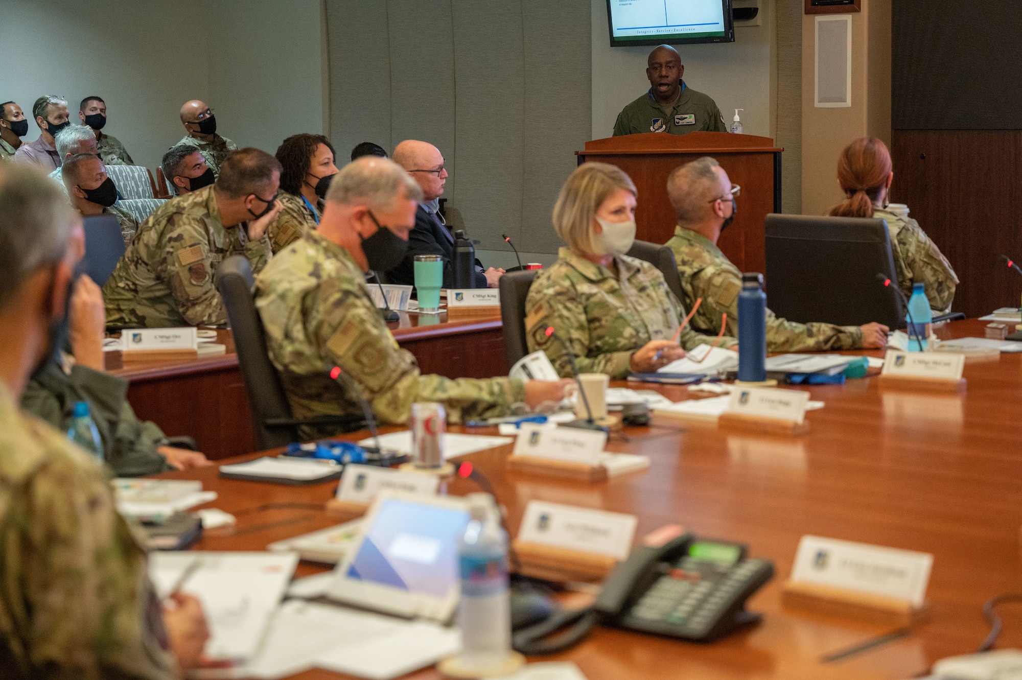 U.S. Air Force Col. Travolis A. Simmons, upper right, 3rd Wing commander, briefs Gen. Ken Wilsbach, Pacific Air Forces commander, PACAF staff, Wing and Numbered Air Force commanders and command chiefs on Action Order B items during the PACAF Fall Commander’s Conference at Joint Base Pearl Harbor-Hickam, Hawaii, Sept. 28, 2021. Wilsbach approved seven action orders during the conference which will allows nine Wings, and three NAFs to accelerate change within the Indo-Pacific region. (U.S. Air Force photo by Staff Sgt. Hailey Haux)