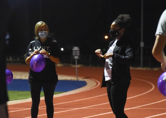 U.S. Air Force Staff Sgt. Sabrina Scruggs, 315th Training Squadron instructor, addresses attendees at the Suicide Awareness 24-Hour Run/Walk on Goodfellow Air Force Base.