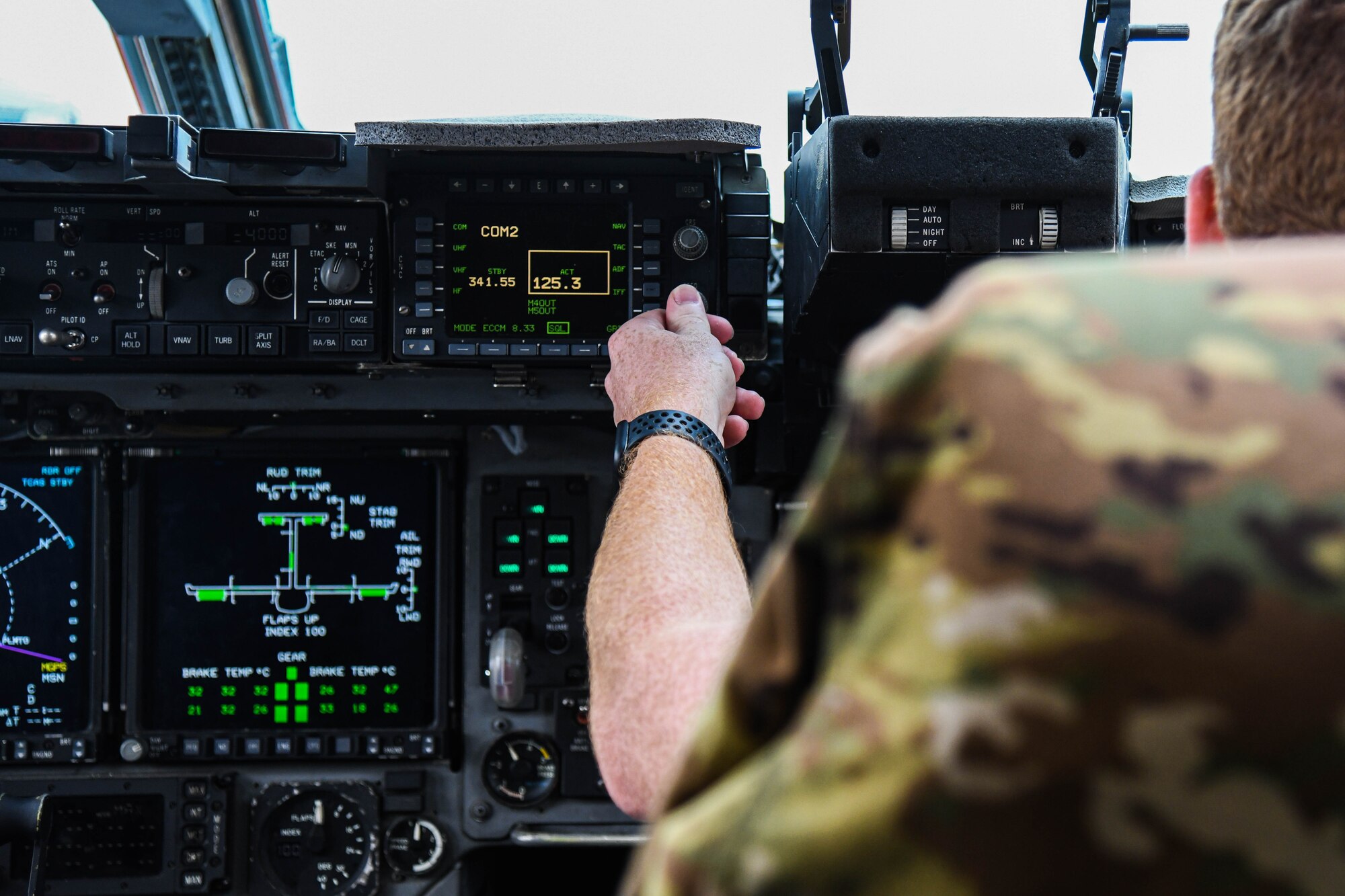 A U.S. Air Force pilot assigned to the 437th Airlift Wing prepares a C-17 Globemaster III for a flight to deliver cargo and troops to Afghanistan at Joint Base Charleston, S.C.
