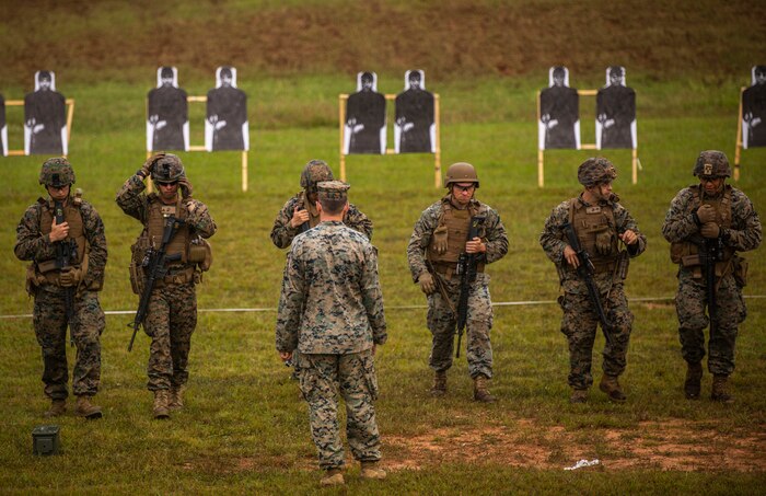 Marines with Combat Marksmanship Coaches Reserve conduct the new Annual Rifle Qualification at Marine Corps Base Quantico, Va., Sept. 21, 2021. The CMCR students are the first to qualify as Combat Marksmanship Coaches under the new ARQ that will soon be implemented across the Marine Corps Total Force. The new ARQ ensures that every Marine is a rifleman, testing Marines’ basic marksmanship skills and ability to effectively engage targets in combat shooting scenarios.