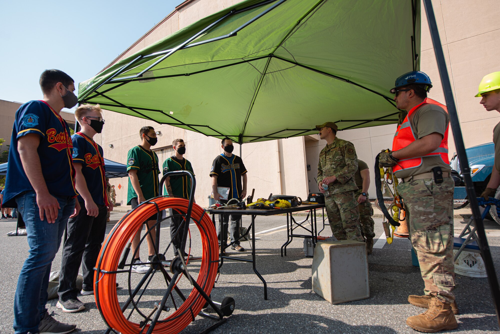 51st Communications Squadron Airmen discuss their daily duties and responsibilities with attendees of an open house event at Osan Air Base, Republic of Korea, Oct. 1, 2021.