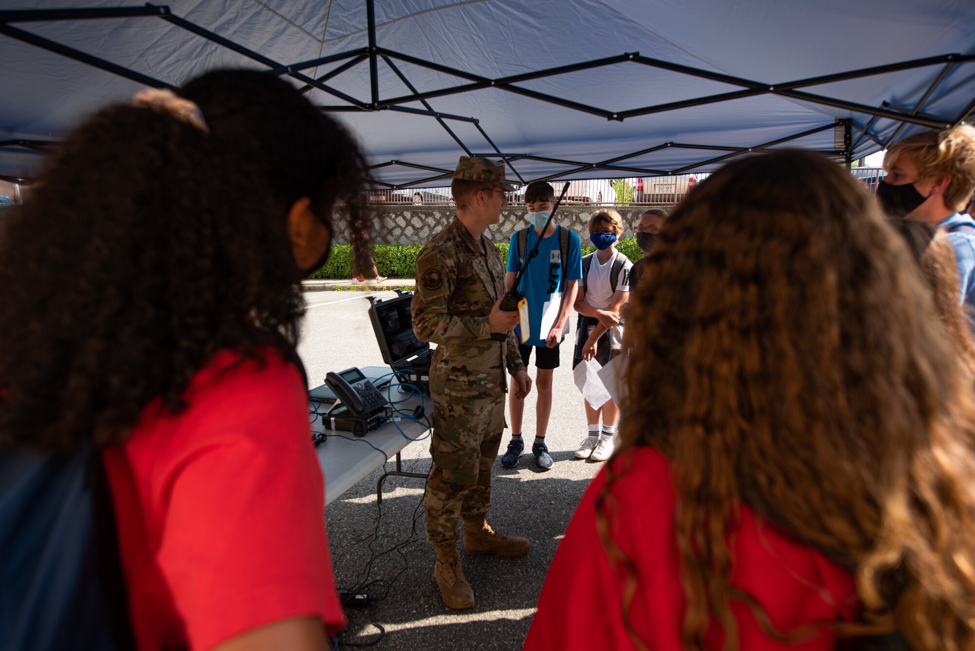 SrA Weston Gerringer, 51st Communictions Squadron radio frequency technician, discusses radio capabilities at Osan Air Base, Republic of Korea, Oct. 1, 2021.
