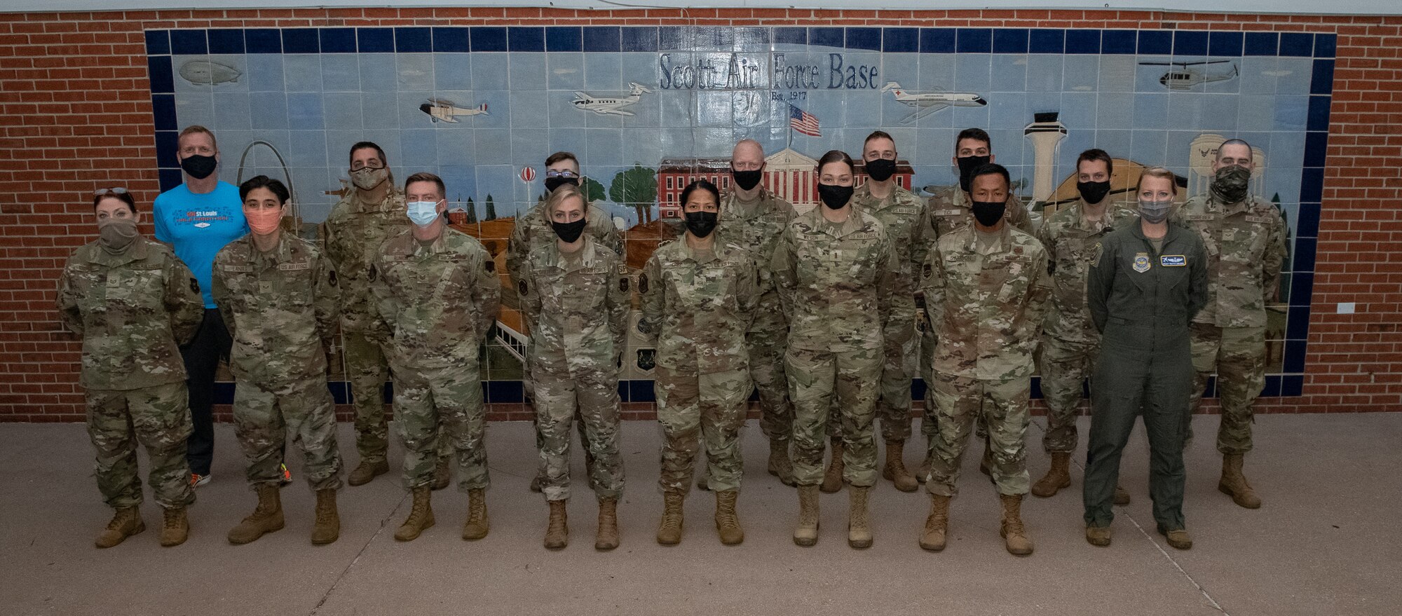 The newest U.S. Air Force Citizen Airmen to join the 932nd Airlift Wing, take a moment between briefings to pose for a group photo, Oct. 2, 2021, Scott Air Force Base, Illinois. Each month the team with Airman and Family Readiness work with various offices to provide informational briefings during newcomers with an initial briefing by Wing leadership. (U.S. Air Force photo by Master Sgt. Christopher Parr)