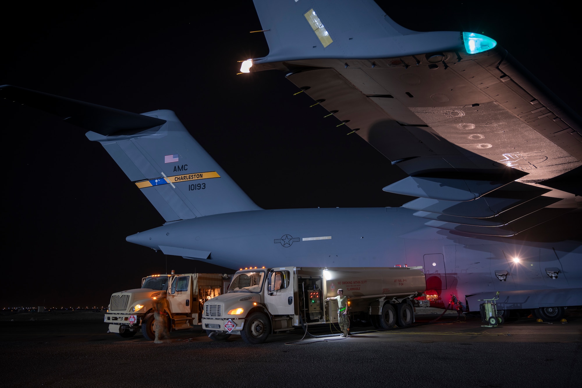 C-17 receiving fuel on the runway