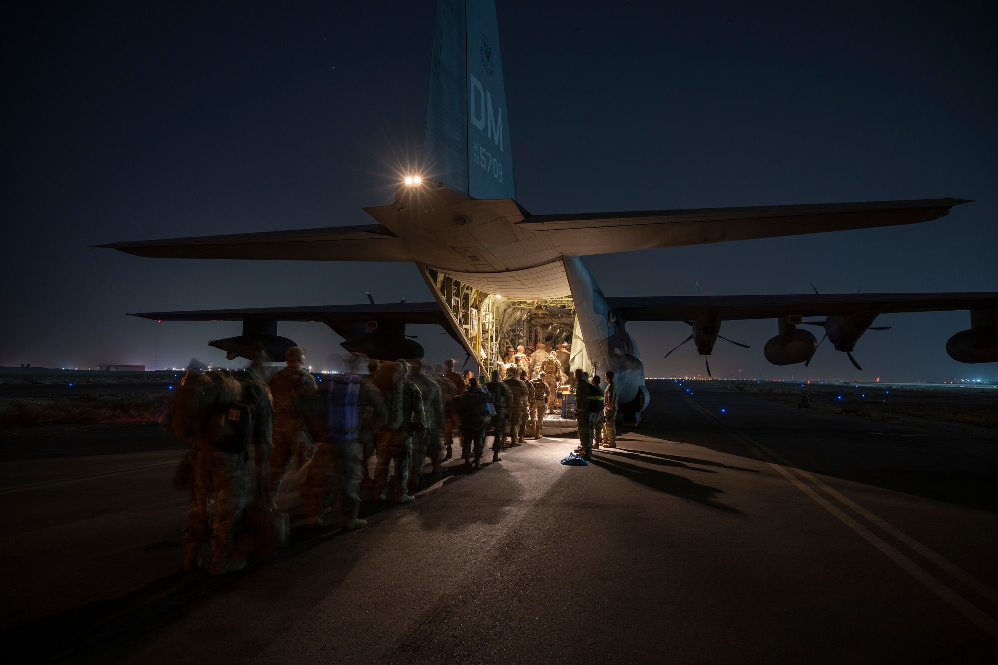 Airmen boarding an aircraft