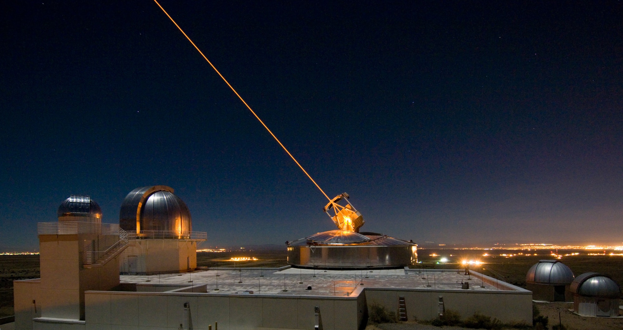 The Sodium Guidestar at the Air Force Research Laboratory's Starfire Optical Range resides on a 6,240 foot hilltop at Kirtland Air Force Base, N.M. The Army and Navy is developing its own laser weapons systems. (U.S. Air Force photo)