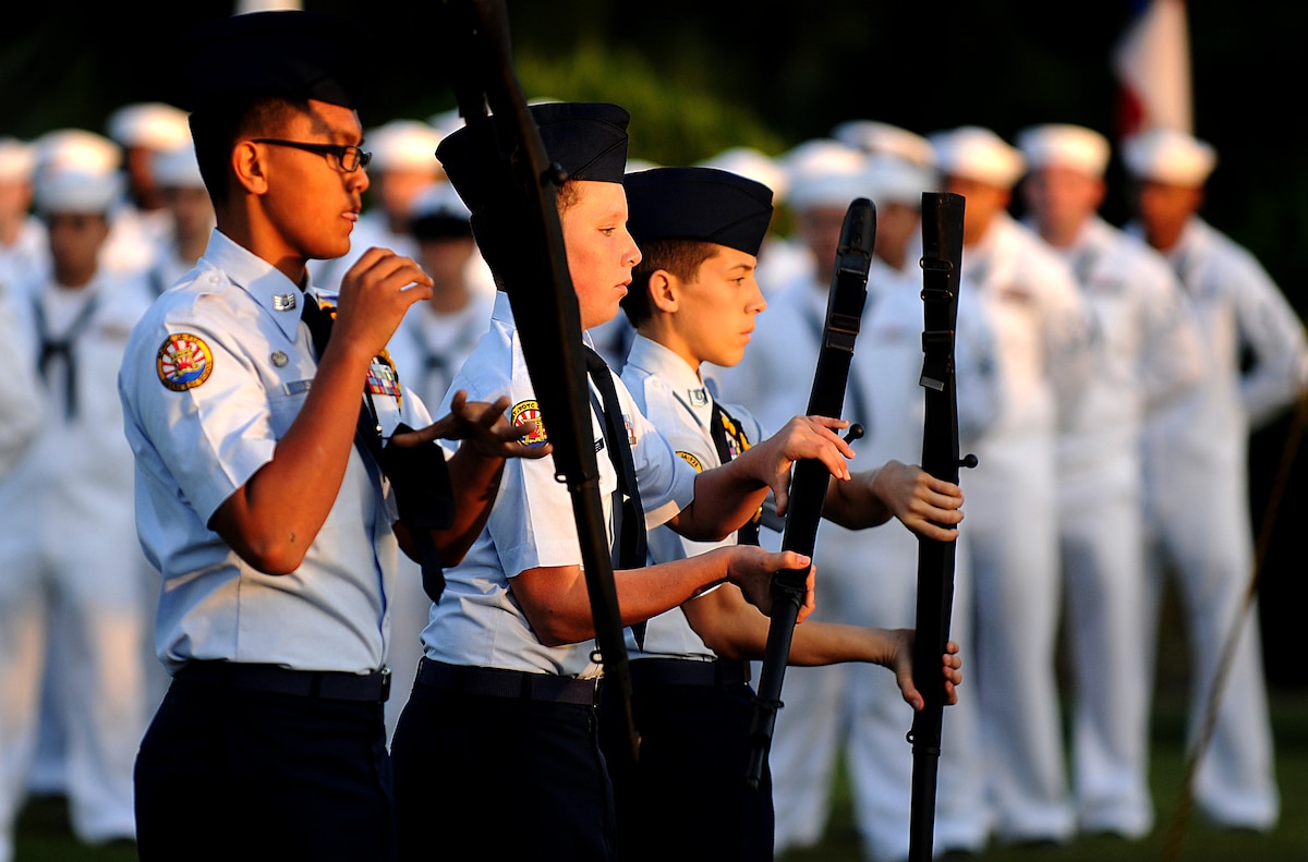 Members of the Kadena Junior Reserve Officers' Training Corps drill team perform at Kadena's Veteran's Day observation ceremony Nov. 11, 2010. (U.S. Air Force Photo by Staff Sgt. Christopher Hummel)