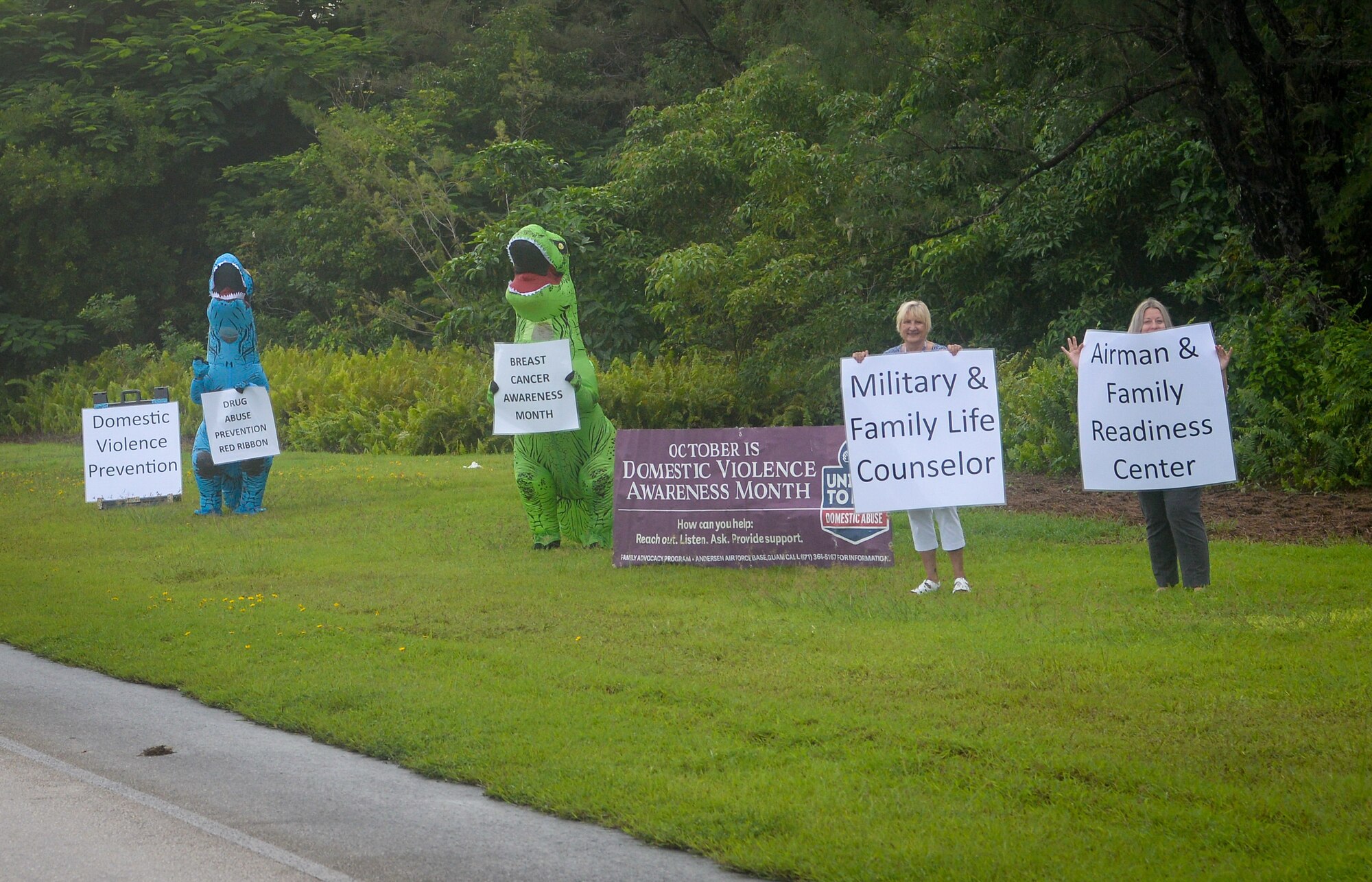 Members of Team Andersen participate in an awareness wave on Andersen Air Force Base, Guam, Oct. 4, 2021.